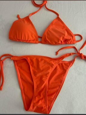 Orange bikini set with adjustable straps size medium